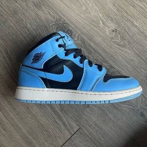 Jordan 1 (blue and black)
Size:Youth 5.5 
Paint pealing on bottom of left shoe
